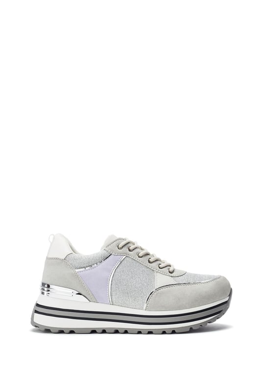 Create new looks in Chanella. This style features a wedge heel for added height and elevated look whilst the contrasting panels and metal details give this trainer a luxe feel.