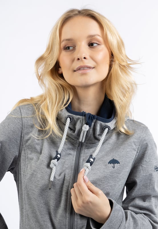 Futter: kein Futter/no lining, Füllung: keine Füllung,  Beschichtung: 100% Thermo-Polyurethan  Ein leichtes, dünnes Jersey-Material auf der Außenseite, volle Funktion in der Innenseite. Dafür sorgt eine Thermo-Polyurethan beschichtete Zwischenschicht, die die Innenseite warm und trocken hält. Ein weiterer Pluspunkt ist die sportliche Longform, die mit einem innen liegenden, elastischen Zugband auf Taille gezogen werden kann. Praktische Elemente wie die Kapuze mit Tunnelzug und Kordel, die Seitentaschen mit Druckknöpfen sowie der 2-Wege-Reißverschluss ergänzen das funktionale Design. Mit dieser Übergangsjacke sind Sie bei allen Aktivitäten an der frischen Luft bestens geschützt.  Funktionsjacke