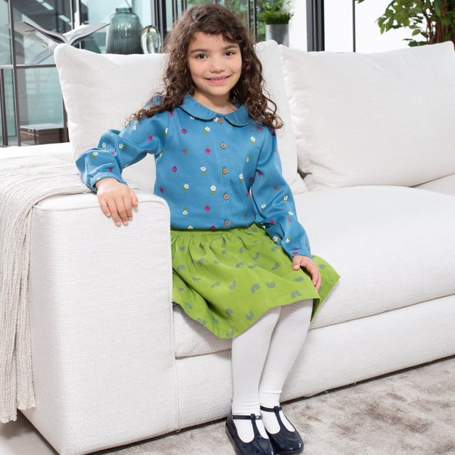 This very special Atlantic blue blouse makes dressing for best, just the best! Made in a printed flannel twill with a pretty lace-trimmed Peter Pan collar, it is designed in our sweet little flora all-over print. This gorgeous style is so versatile and you can even find this print on a dress, skirt or leggings so siblings and friends can mix and match.