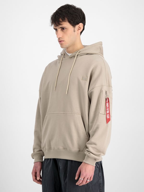 Alpha Industries Essentials RL Hoody. Kangaroo pocket. Utility Pocket with RBF Tag. Woven 3D Alpha logo rubber label