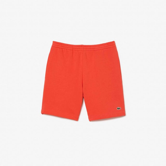 Men's Lacoste Organic Brushed Cotton Fleece Shorts Regular fit  straight cut: Unrestricted movement. Drawstring at waist: An adjustable waistband for optimal comfort. Piped back pocket: Practical and functional. Embroidered crocodile sewn onto front: Lacoste signature performance. Brushed organic cotton fleece: Long-lasting comfort during practice.