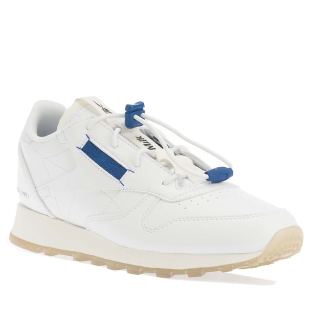 Mens Reebok x Milk Makeup Classic Vegan Shoes in white blue.- Textile upper.- Lace up fastening.- Reebok Vector logos.- Lateral-side logo window.- Reebok branding embellishes the tongue and lateral heel.- Lightweight cushioning.- EVA midsole.- Rubber outsole.- Ref: 100072023