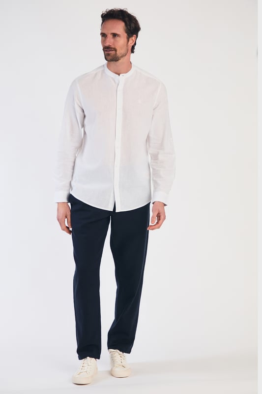 Upgrade your wardrobe with this long-sleeved linen shirt from Nines by Kensington Eastside. Made from a breathable blend of linen and cotton, this shirt features a grandad collar and button fastening. Perfect for casual and formal occasions, this machine-washable shirt is a versatile addition to any wardrobe.