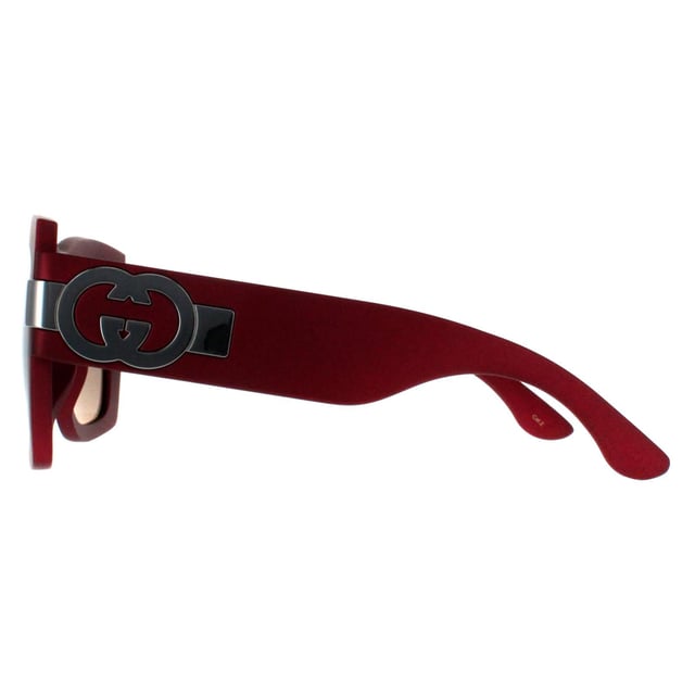 Gucci Square Womens Red with Silver Grey with Light Silver Mirror GG1688S  Sunglasses offer a perfect combination of modern sophistication and understated luxury. With their bold, square frame, these sunglasses make a striking fashion statement while maintaining a timeless appeal suitable for various occasions. The design is complemented by Gucciâ€™s signature double-G logo on the temples, adding a touch of iconic branding that speaks to the wearerâ€™s impeccable taste. High-quality lenses provide essential UV protection, ensuring comfort and safety without compromising on elegance.