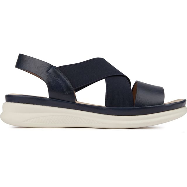 Omarm de zonnige dagen met gemak en een veerkrachtige stap, met de Kia-sandalen van Solesister. Ontworpen met een rekbaar, nauwsluitend bovenwerk met bandjes en een comfortabel, gewatteerd voetbed voor een tijdloze zomerlook met stijl en comfort in gedachten. De sleehak zal je stap naar een hoger niveau tillen.