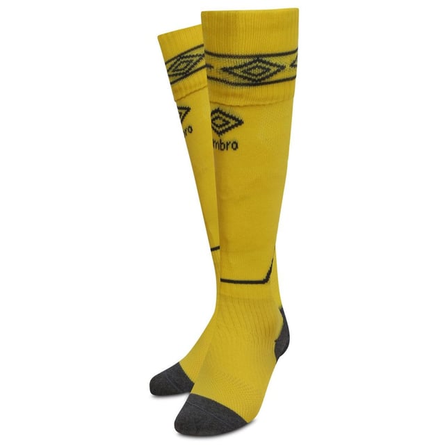 75% Polyamid, 20% Baumwolle, 5% Elastan. Gewebe: Intarsia, Micro-Mesh. Marke: Umbro. Design: Kontrast, Logo. Bündchen: Elastisch, Bündchen zum Umklappen. Elastischer Fuß, Flache Naht an der Zehe, Gepolsterte Sohle, Ventiliert. Kniehoch.