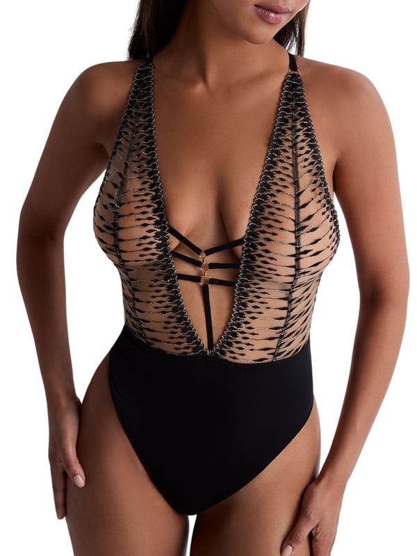 Aubade Voodoo Kiss Bodysuit. Non-wired bodysuit with a low cut back, adjustable decorative straps, gold lurex threads, and a deep plunging neckline. Matching briefs available. This item is recommended for hand wash only.