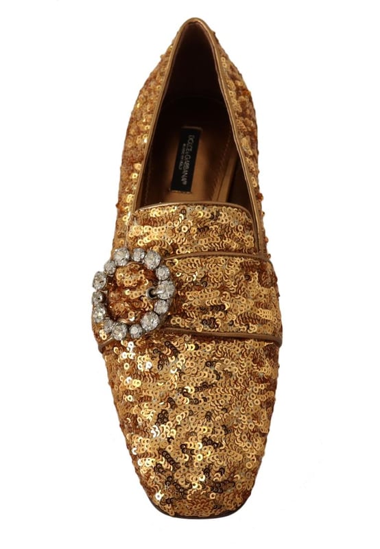 Marca: Dolce & Gabbana.
  Condicion: Nuevo con etiquetas.
  Estilo: Mocasines planos.
  Detalle: Gemas de lentejuelas y cristales.
  Puntera: Cuadrada.
  Plantilla: Piel con logo cosido.
  Material: Mordore y paillette.
  Color: Dorado.
  Adorno: Cristal transp.