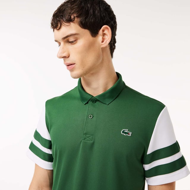 Designed for Tennis  for a regular frequency of use This product is providing you Ultra Dry technology which guarantees you to keeps you dry even during pratice. This polo is made in 100% recycled polyester Regular fit: natural ease on body The technical capsule offers the complete seasonal wardrobe on and off court with a strong colorbloking. LACOSTE wording print at back neckline