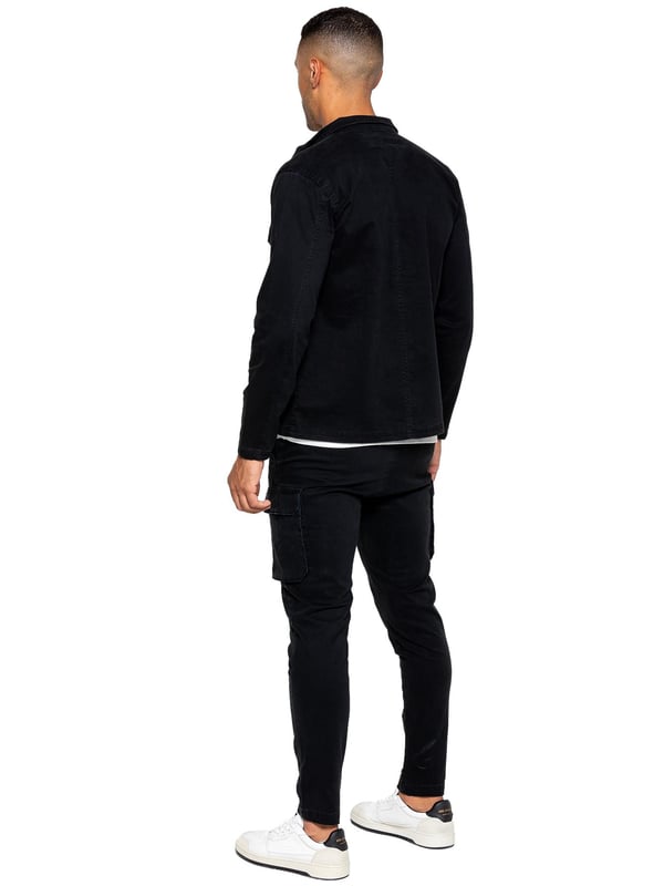 The Enzo cargo overshirt jacket features a long-sleeved, zip-up design with a collared neckline for a classic look. With two front flat cargo pockets and two side welt pockets, you'll have ample storage for all your essentials. The stitched trims on the sleeves and hemline add a touch of detail to this versatile piece.