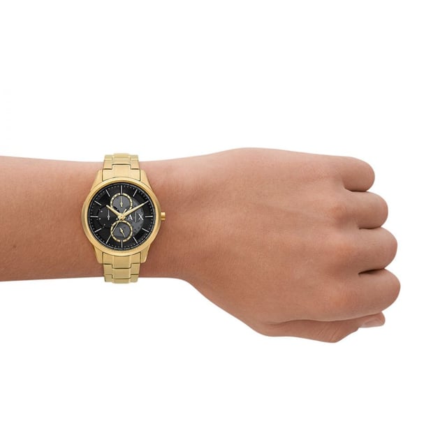 This Armani Exchange Dante Multi Dial Watch for Men is the perfect timepiece to wear or to gift. It's Gold 42 mm Round case combined with the comfortable Gold Stainless steel watch band will ensure you enjoy this stunning timepiece without any compromise. Operated by a high quality Quartz movement and water resistant to 5 bars, your watch will keep ticking. This fashionable and classic watch matches any outfit at any occasion,it adds style to your life  This Multi Dial watch has a Calendar function: Day-Date and 24-hour Display High quality 20 cm length and 21 mm width Gold Stainless steel strap with a Fold over with push button clasp Case diameter: 42 mm,case thickness: 9 mm, case colour: Gold and dial colour: Black