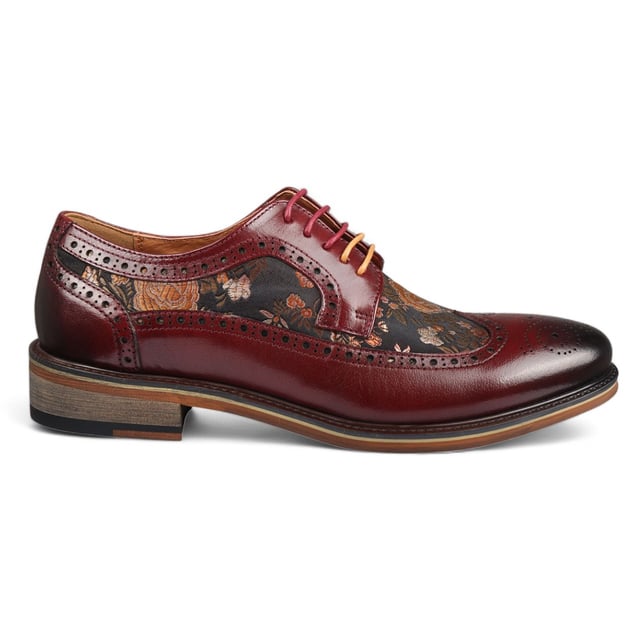 Add a unique touch to your formal wardrobe with the Ross Men's Floral Print Leather Brogue Shoes. Crafted from 100% premium leather, these brogues combine style, durability, and comfort. Featuring classic brogue detailing with decorative patterns, they bring elegance and sophistication to any look.

Unique Floral Print for a bold, stylish statement
Premium Leather for durability and luxury
Classic Brogue Detailing for timeless appeal
Lace-Up Design for an adjustable fit