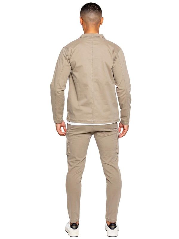 Enzo Mens Cargo Trousers. Regular Fit, Straight Leg, Enzyme Wash. 5 Pocket Design. 2 Side Pockets, 2 Cargo Pockets With Velcro Fastening. Single Back Welt Pocket. Elasticated Waistband With Adjustable Drawstring