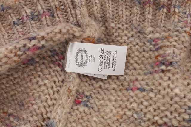 Brand new with tags
  Oversize fit
  V-neck design
  Made in Italy
  Quality materials: 57% PC 20% WM 10% wool 13% PA
  Subtle logo details
  Versatile and easy to style
Material: 57% PC 20% WM 10% Wool 13% PA
