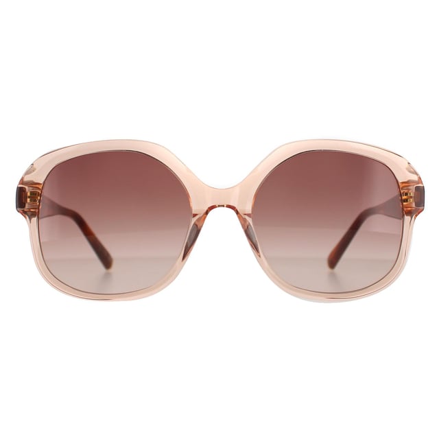 Las gafas de sol Ted Baker Square Womens Crystal Orange Pink Gradient TB1685 Eloise son la encarnación del glamour refinado y la elegancia contemporánea. Estas gafas cuentan con una montura de gran tamaño adornada con los toques icónicos de Ted Baker, que combinan la sofisticación clásica con el encanto moderno. La atrevida silueta irradia confianza, mientras que las lentes de alta calidad garantizan una claridad superior y protección UV. Suficientemente versátiles para cualquier ocasión, ya sea para descansar junto a la piscina o para explorar la ciudad, estas gafas de sol elevan sin esfuerzo cualquier look con un toque de elegancia y glamour sin esfuerzo.