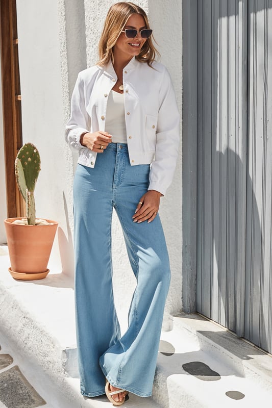 This season's coolest cover-up
Lightweight cotton makes it the perfect summer layer
Trending bomber style
Elevated with luxe gold hardware
White goes with everything
Style with cargo trousers for an on-trend combo