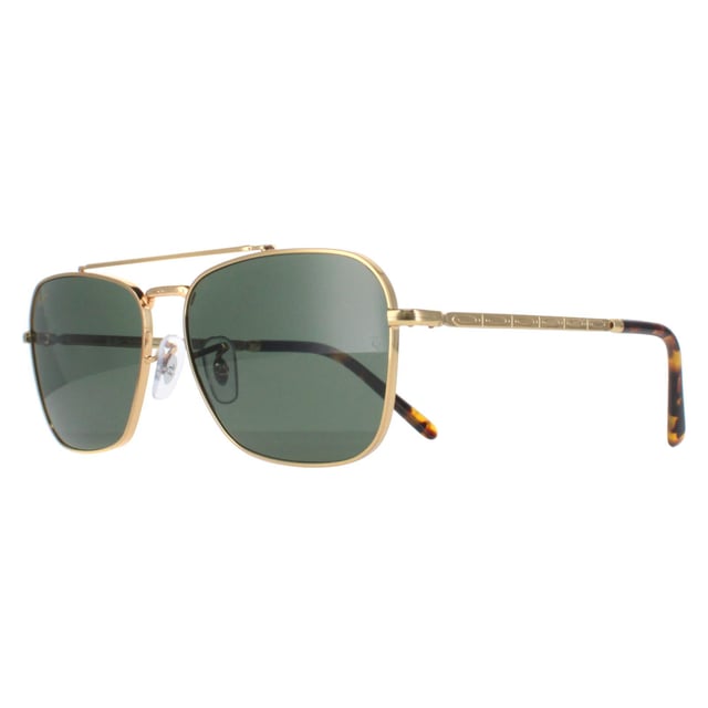 Ray-Ban Square Unisex Gold Green RB3636 New Caravan  Sunglasses are a sleek and sophisticated square silhouette that echoes retro charm with a modern twist. Crafted with precision, the metal frame offers durability and style, while the carefully selected lenses provide both clarity and UV protection. The distinct yet versatile design of the RB3636 new square sunglasses makes them a must-have accessory, elevating any ensemble with their timeless appeal and hint of modern sophistication, ideal for those seeking iconic style fused with functionality and quality craftsmanship.