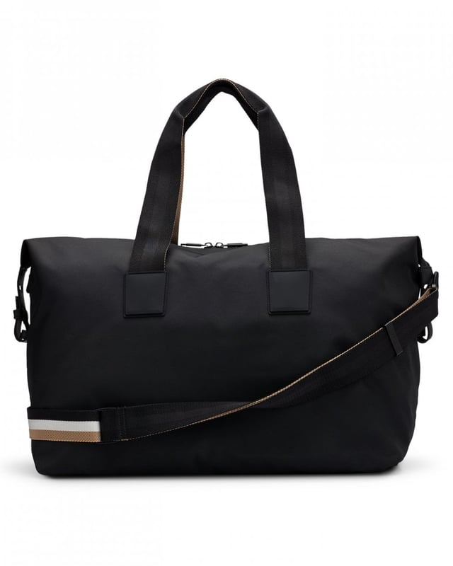 A cleanly styled holdall by BOSS crafted in textured material with contrast branding and signature-stripe detailing on the handles and removable strap. For our BETTER BOSS products, we always use at least 60% better raw materials. This product is made from at least 60% recycled polyester. Recycled polyester is an artificial fibre made from oil-based waste such as old PET bottles. Measurements: 26 x 48 x 26cm
Length: 48,0 cmWidth: 26,0 cmHeight: 26,0 cmFastening top: Two-way zip closureDouble handlePackaging: Dust bag
100% Polyester (recycled), Lining: 100% Polyester (recycled), Facing: 100% Polyamide (recycled), 60% Polyurethane, 40% Polyester
 
50511942
 
 