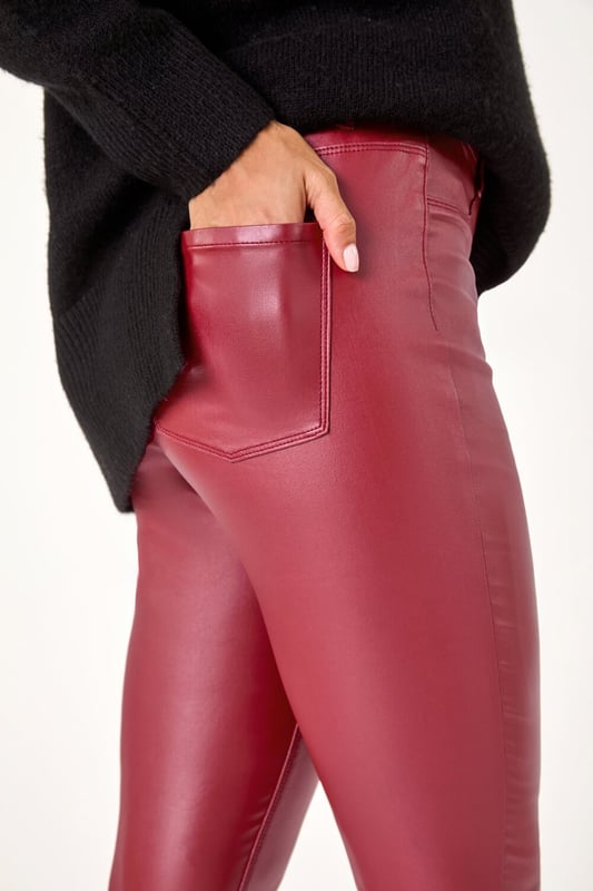 Coated Faux Leather Jeggings from Roman. A twist on the classic faux leather leggings, this pair have all the intricate details you would find on denim. Functional back pockets and belt loops make these jeggings practical and easy to style. They have flattering stitch detail for extra interest. Cut in a skinny style from a stretch woven fabric these are designed to pull on for fuss free fashion!