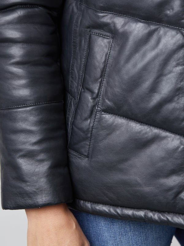 Parton Leather Padded Jacket in Black The contemporary Parton leather padded jacket will keep you warm during the colder months. As well as its cosy puffer style, the Parton features a number of insulating elements, including a high neck, drawstring waist, elasticated cuffs and inner placket.Crafted from soft black aniline leather and cut to a slightly longer length, this jacket is a relaxed fit for a comfortable wear and so you can easily fit your favourite knitwear underneath.SizingThese measurements are based on a size 12 and will vary slightly between sizes.Approximate centre back length (from top of neckline): 68cmApproximate sleeve length from shoulder to cuff: 63cm Approximate sleeve length from underarm to cuff: 43.5cmThe DetailsStyle Name: Parton Leather Padded JacketColour: BlackMaterial: Aniline LeatherFit: Easy fitPadded designHigh-cut neckCentre zip fastening with inner placketTwo front slip pocketsElasticated cuffsDrawstring waistAnd on the insideFabric lining