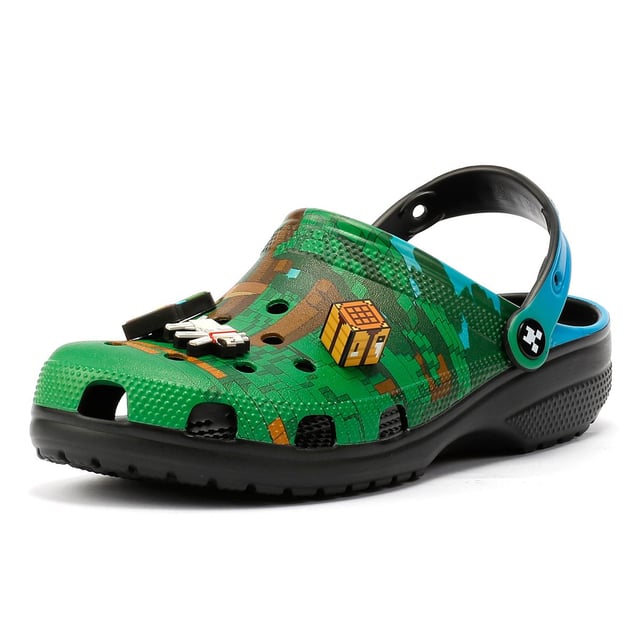 Minecraft-inspired clogs featuring 3D block Jibbitz™ charms for a playful, game-themed design. Crafted with a soft, flexible upper and ventilation holes for enhanced breathability, keeping feet cool.