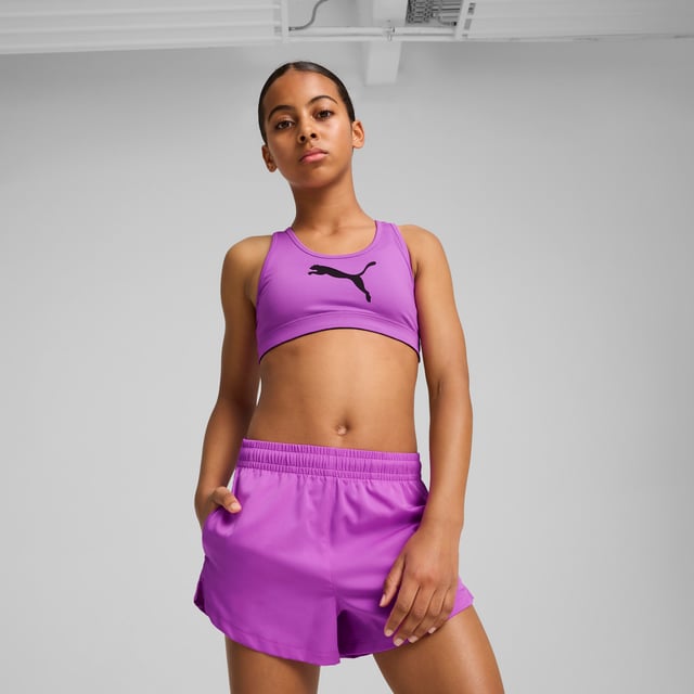 PRODUCT STORY: Feel unstoppable with this PUMA training bra. Featuring a sleek Cat Logo and dryCELL technology to keep you dry, it's designed for high-energy workouts. Embrace your fitness journey with confidence and style, knowing you're ready for anything. FEATURES & BENEFITS: Made with at least 50% recycled materials; dryCELL: Performance technology designed to wick moisture from the body and keep you free of sweat during exercise. DETAILS: Tight fit; Single jersey; Regular length; Sleeveless; PUMA branding details; PUMA Youth: Recommended for older kids between 8 and 16 years.  Our model is 154 cm tall and is wearing size 152 RUS.