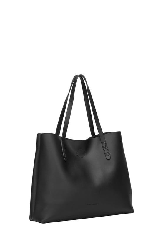 Let simplicity be key with the Ophelia tote bag, perfect for taking your look through the week. In a range of colours this tote is made from unlined PU making it lightweight and spacious. With simple design features such as the Claudia Canova debossed logo, this bag is perfect for everyday sleek style. The bag fastens with a mag-dot clasp and inside reveals an inner pouch with a zip fastening to keep all your daily essentials safe. Features: , Unlined PU, Claudia Canova debossed logo, Mag-dot clasp fastening, Twin grab handles, Soft and flexible shape, Removable inner pouch with zip fastening Style Ref: 84395