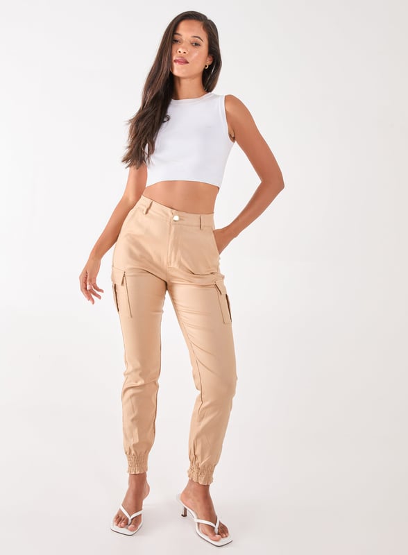 Featuring a PU material and buckle detailing. Team our Cuffed Cargo Trousers with your existing wardrobe pieces for a blogger-worthy look.