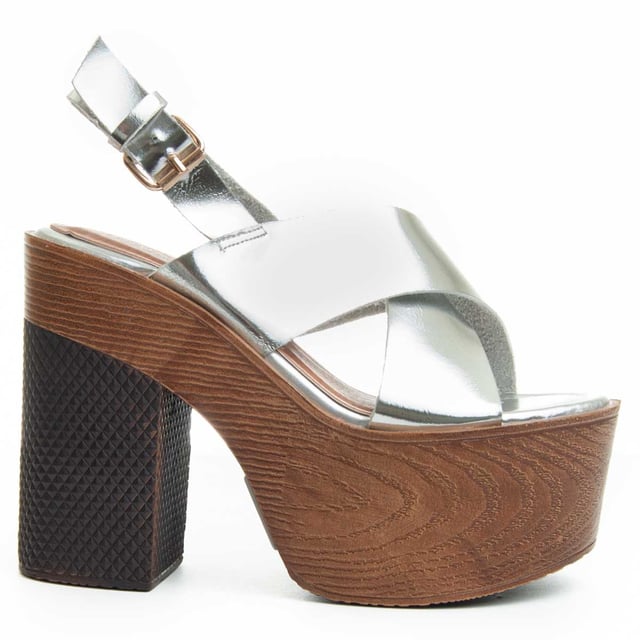 Women's high heel sandals. Comfortable fit. Padded insole. Non-slip sole. Reinforced stitching. Manufactured by other brands for our brand. Approximate size: 12 cm heel and 5 cm platform.