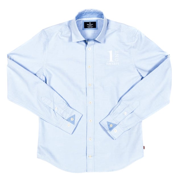 Boy's long sleeve shirt.
 Lapel collar.
 Button closure on the front.
 Custom embroidery by the brand, on the upper front side.
 Cuffs with button closure.
 Fabric label with the flag of the United Kingdom and the name of the brand, on the lower side.
 Seams seen in tone.
 Composition: 100% cotton
 Care:
- Wash maximum at 30ºC.
 - Iron at medium temperature, max. 110ºC.
 - It is not allowed to use a dryer.
 - Do not use bleach.
 - Does not support dry cleaning.