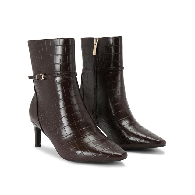 This KG Kurt Geiger Impress Ankle Boot features a brown croc embossed upper. There is a thin ankle strap around the ankle with gold tone buckle. Heel height: 6cm.