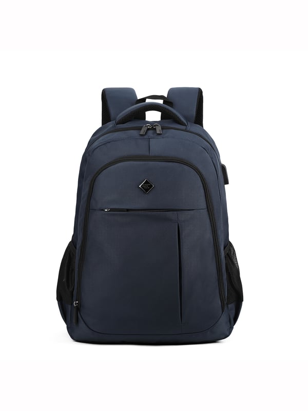 Mochila unisex. El cierre es con cremallera. Los bolsillos internos son uno abierto. Hay tres bolsillos externos con cremallera y dos laterales abiertos. Falta la correa para el hombro. El asa es de tela. Hay un compartimento interno. El material exterior es poliéster. Internamente está forrado en poliéster. Medidas: 49x37x17 cm. Producto de moda