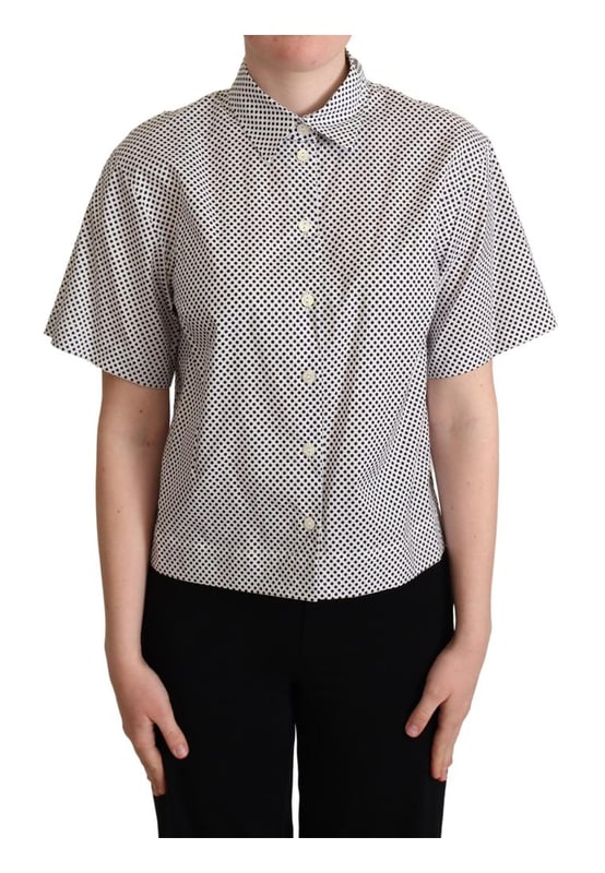 A estrenar con etiquetas.
  Confeccionado con algodon de la mejor calidad.
  Elegante estampado de lunares en tonos negros.
  Fabricado en Italia.
  Polo de manga corta con cuello.
  Presenta los detalles iconicos del logotipo de Dolce & Gabbana.
  Color: Neg.