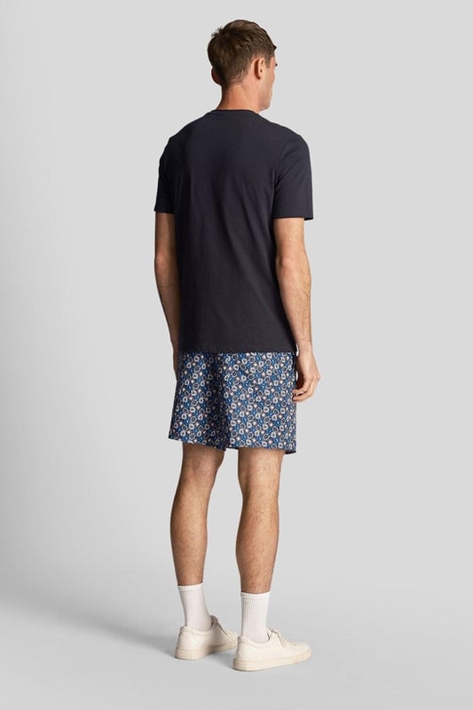 Designed to be worn with a plain tee or the matching floral print shirt, these mesh-lined resort swim shorts, with fast-drying fabric, deliver the iconic Lyle & Scott style both in and around the pool.