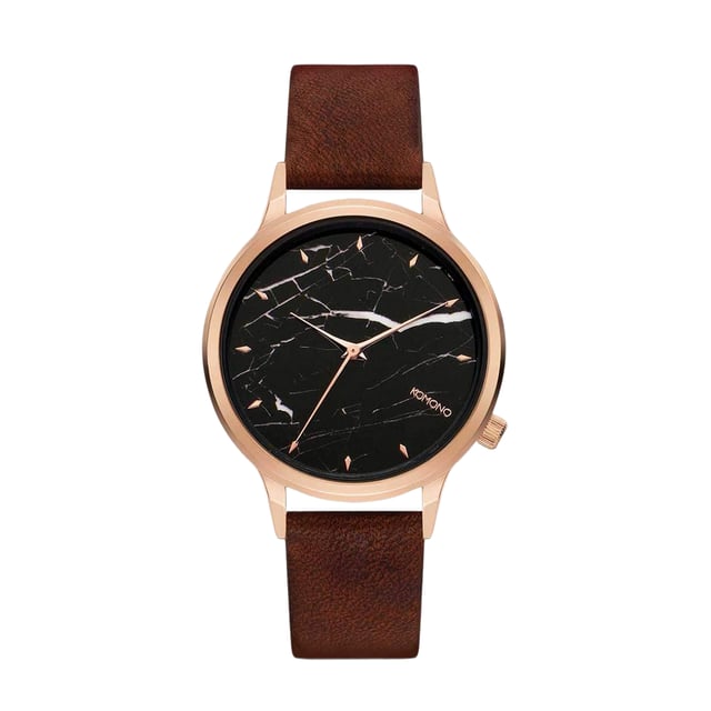 Komono KOM-W2765 - Damenuhr Quarz aus Edelstahl• Material: Edelstahl• Glas: Mineral• Armband: Leder• Farbe: Rosegold• Wasserbeständigkeit: 30 m (3 ATM)• Gehäusegröße: 36 mm