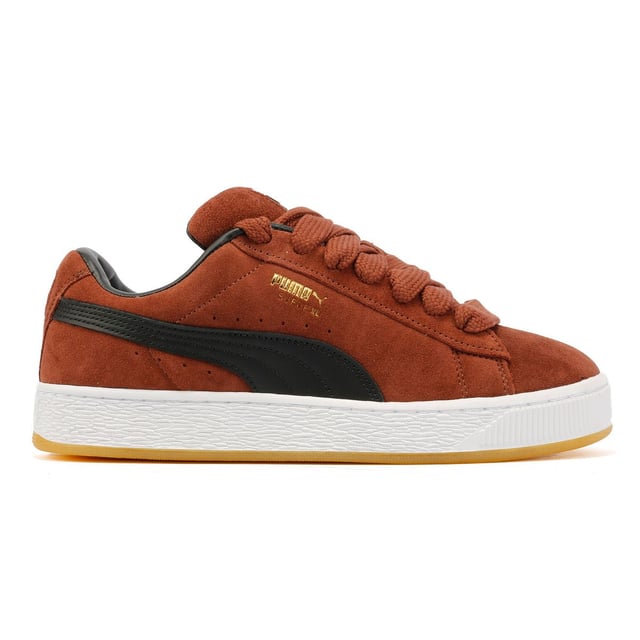 Sneakers featuring a premium suede upper for a sleek and stylish look. Debossed and foil-printed PUMA branding on the quarter panel adds a touch of sophistication. Finished with a durable rubber sole for reliable traction and comfort.