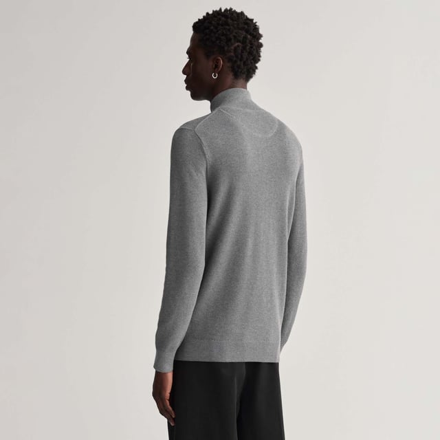 A classic zip-up sweater with a preppy twist. Our Cotton Piqué Zip Cardigan has a piqué knit structure that sets it apart from your usual knitwear  and firmly cements it as a timeless  preppy classic you'll reach for time and time again.