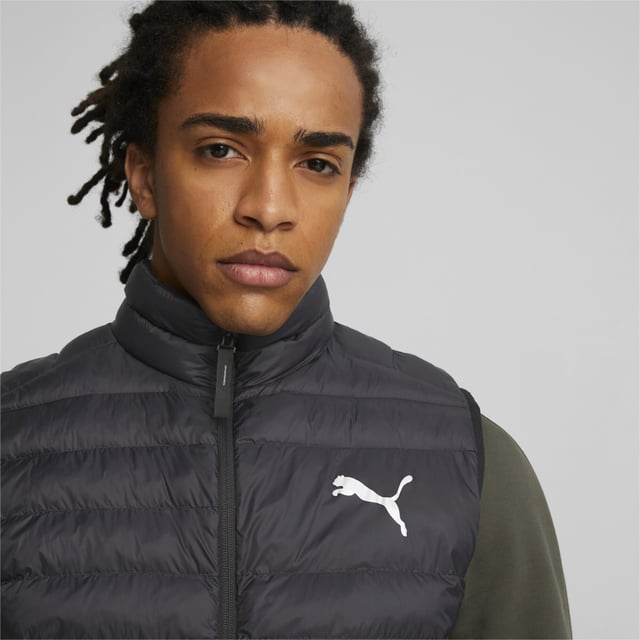 PRODUCT STORY: The PackLITE vest does exactly what it says on the tin: it's an ultra-lightweight design that packs down neatly into its own pocket. When unfurled, it combines the weather-proof power of insulating warmCELL, wind-shielding windCELL, and a water-repellent coating. Perfect for outdoor adventurers who never know when they might be taking on the next challenge. FEATURES & BENEFITS: warmCELL: Breathable cold weather technology designed to trap heat close to your body and keep you warm during exercise; windCELL: Technology designed to protect against the wind and keep you comfortable during exercise; Recycled Content: Made with at least 20% recycled material as a step toward a better future. DETAILS: Slim fit; Signature tape on the back; Stand-up collar; Full-zip closure; Side seam pocket into which the vest can be packed down; Internal chest pocket; PUMA Cat Logo print on the left chest; PUMA Wordmark print on the back; PrimaLoft® insulation.