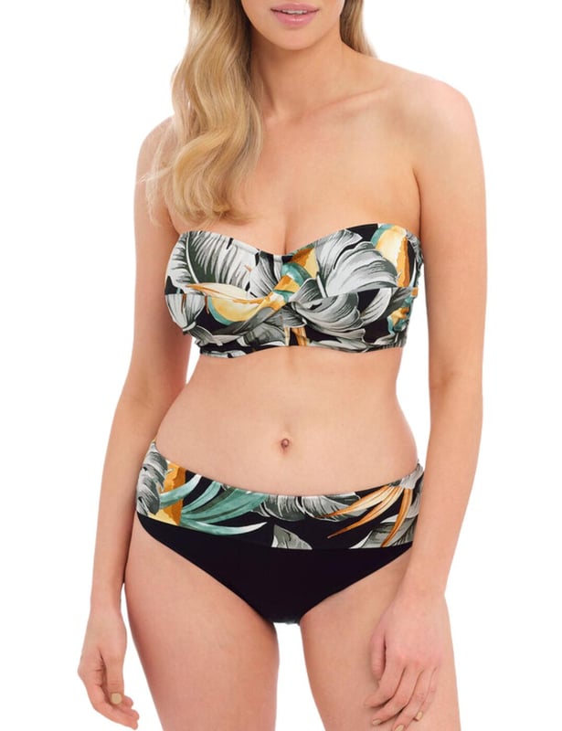 Add a splash of style to your summer poolside looks with the Fantasie Bamboo Grove bandeau bikini top. Boasting an eye-catching botanical print and a sweetheart neckline, this on-trend look will help you feel confident and stylish all season long. The concealed underwiring, lightly padded foam cups, and Powernet lining provide that extra support needed while its detachable scarf tie strap provides extra security while adding something special to your swimwear collection. The clip fastening ensures the utmost reliable fit. With many items available for a matching set for an enviable head-to-toe look, the Bamboo Grove bandeau bikini top is sure to turn heads this season!  Bandeau bikini top, Botanical print Twist front, Sweetheart neckline, Concealed underwiring, Lightly padded foam cups, Powernet lined for extra support, Detachable scarf tie strap, Clip fastening for a secure fit, Matching swimwear available, Country of origin: Tunisia, Composition: 83% Polyamide | 17% Elastane, Listed in UK sizes.   Bandeau Bikini Top