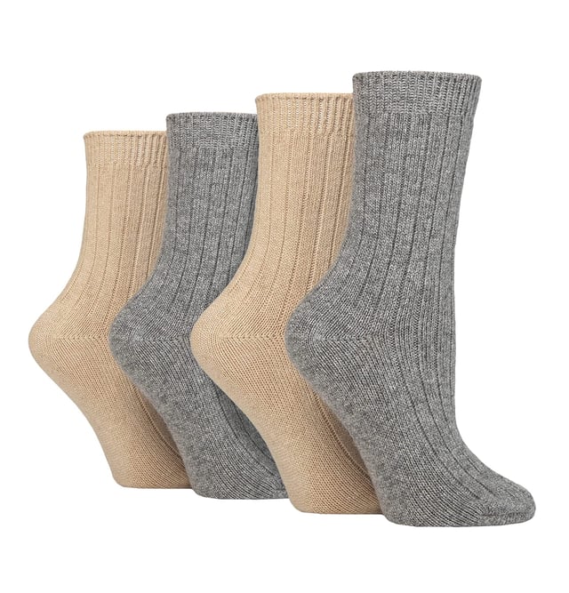 These ladies’ Wildfeet Cashmere Socks are the socks of luxury and comfort. Made from a blend of natural wool, viscose, and cashmere, they are designed to provide warmth and cosiness throughout the day, whether you're running errands or relaxing at home. These socks offer the perfect balance of luxury and practicality with a blend of wool, viscose, and cashmere. The soft and comfortable material provides warmth and insulation to keep your feet cosy in the cold weather while also being breathable and moisture-wicking. The combination of fibres makes these socks more durable, ensuring long-lasting wear, while the ribbed leg enhances comfort. The crew length and medium gauge thickness make them a good choice for any leisure shoes or boots, adding a touch of comfort to any outfit. These 4 pairs of Wildfeet Cashmere Socks come in 2 gift boxes and attractively wrapped with a satin ribbon bow, which makes them ideal for gifting to friends or family. Maybe even a last minute Christmas present or stocking fillers? Wild Feet is a range of socks featuring cool designs, bold colours and quirky catchphrases - from pugs and penguins, to lions and llamas! Choose from a range of styles for men and ladies, from dress to trainer socks. There are even some sporty styles available! There are 14 colours to choose from. They come in one size Ladies 4-8 UK, are made from 37% Wool, 27% Viscose, 24% Polyamide, 11% Cashmere, 1% Elastane and are machine washable.