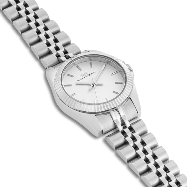 GENERAL INFORMATION:  • Targetgroup: Female  • Wristwatch: No Special Functions  • Display: analogue  • Weight of watch w/o box (gr.) - approx.: 61,0  • model series: Cassina  MOVEMENT:  • Movement: Quartz  • Term of Movement: 2035  • Origin of movement: Japan  BRACELET:  • Material of bracelet/strap: Stainless steel  • Plating of bracelet/strap: None  • Finishing of bracelet/strap: Polished/brushed  • Finishing/Decoration of bracelet/strap: None  • Clasp/Closure/Buckle: Security-folding clasp  • Color of bracelet/strap: Silver  • Length of bracelet/strap (mm) approx.: 220,0  • Width of bracelet/strap (mm) approx.: 13,9  • Style/Design of bracelet/strap: Link bracelet  • Bracelet/strap adjustable?: Yes  CASE:  • Shape of case: Round  • Size/Diameter of case in mm . approx.: 27,5  • Height of case in mm: 8,9  • Case material: Stainless steel  • Surface of case: Brushed  • Bezel/Topring: Fixed  • Finishing/Decoration of case: Grooved  • Material of case back: Stainless steel  • Lock of case back: Pressed  • Color of case: Silver  • Coating/Plating (Case): None  • Type/Form of crystal: Flat  • Material of crystal: Mineral crystal  • Water resistant (ATM): 5  DIAL:  • Size jewelry care cloth: Hour, Minute, Second  • Indices: Line indices  • Material of dial: Brass  • Structure/pattern of dial: Flat  • Color of dial: White  PUSHER, CROWN, HAND:  • Pusher: No screwed-in crown  • Corrector: No  • Crown: No screwed-in crown  • Type of hands: Obélisque hands  • Luminescent (hands): No  PACKAGING & SCOPE OF DELIVERY:  • Box: Yes  • Service booklet: Yes  • Manual: Yes