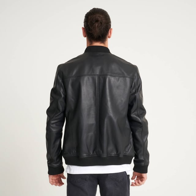 Cover all bases with this classic leather bomber jacket from Barneys Originals. Cool and casual, this jacket can be paired with just about any outfit. Easy to throw on, with timeless style, there are few jackets that compare to this sheep leather essential.