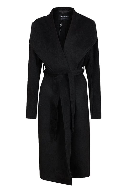 This timeless black coat boasts a luxurious, woolly-feel fabric, shawl collar, and open front design for effortless layering. Unlined, with belt loops and matching self-tie belt.

Soft Tweed Style  Polyester Fabric
 
100% polyester
 
Revere Collar
  
Length: Long
 
43" Shoulder to Hem
    
Sizing: As expected¬†
 
Fit: Relaxed
  

These are end of line ex Threadbare and may not be in original packaging
