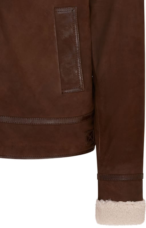 This rugged yet refined bomber jacket is a wardrobe staple. Crafted from genuine sheep suede, it exudes timeless style and durability. The plush faux fur lining offers exceptional warmth and comfort, making it ideal for colder months. With its classic aviator design and functional features like zipped pockets, this jacket is as practical as it is fashionable.

Bullet Points:

Material: Real sheep suede exterior, faux fur lining
Features: Two front zipped pockets, aviator style, adjustable waist
Comfort: Warm and cozy thanks to the plush faux fur
Style: Classic and versatile, perfect for casual or semi-formal occasions
Durability: Built to last with high-quality materials and construction