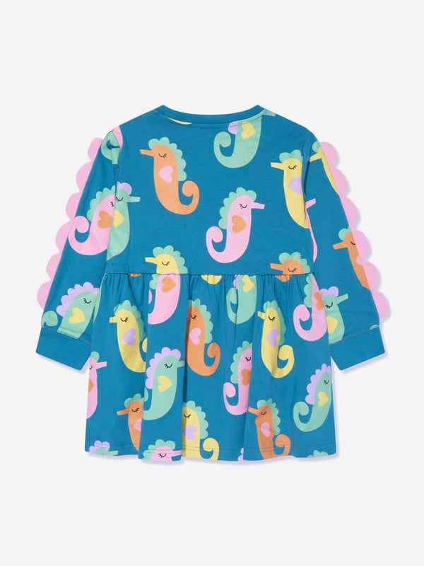 Stella McCartney project a dreamy whimsical nature in their eco-friendly aesthetics. This girls azure dress is reflective of the label's high quality construction and innovative outlook. Crafted in beautiful organic cotton via side pockets and a pink crest on the shoulders. It is embellished with all-over seahorse print. Long Sleeves Ribbed Crew Neck and Cuffs 100% Organic Cotton