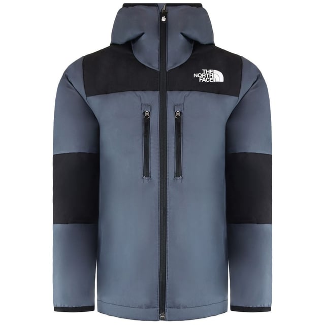 The North Face Light Synthetic Kids Jacket is the perfect outerwear choice for young adventurers, providing warmth, comfort, and a stylish look. Designed for active children, this jacket is suitable for various outdoor activities, whether it's a chilly day at school or a weekend hike in the mountains.
Key Features:


Modern Design: The jacket features a contemporary color palette of grey with contrasting black panels, giving it a sleek and stylish appearance that kids will love.


Lightweight and Insulating: Crafted with synthetic insulation, this jacket provides excellent warmth without the bulk. It ensures that kids stay cozy during colder weather while allowing for easy movement.


Durable Fabric: Made from high-quality materials, the jacket is designed to withstand the wear and tear of active play. The fabric is also water-resistant, providing protection against light rain and moisture.


Functional Pockets: Equipped with two zippered chest pockets, this jacket offers secure storage for small essentials, like snacks, keys, or gloves, making it practical for everyday use.


Adjustable Features: The adjustable hood helps to protect against wind and rain, while the cuffs and hem provide a snug fit to keep the cold out, ensuring a comfortable experience during outdoor adventures.


Brand Recognition: Featuring the iconic North Face logo on the chest, this jacket signifies quality and a commitment to outdoor exploration, encouraging kids to embrace their adventurous spirit.


The North Face Light Synthetic Kids Grey Jacket is an ideal blend of style, functionality, and warmth, making it a go-to choice for any child who loves to explore the outdoors while staying cozy and fashionable.