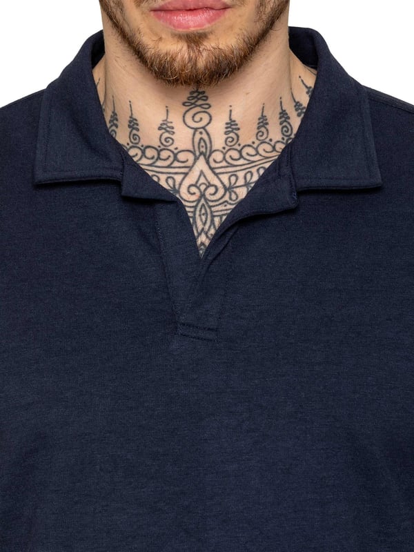 Upgrade your summer wardrobe with the Enzo Milano Short Sleeve Polo Shirt. Made from premium quality fabric, this polo shirt ensures both comfort and durability. Designed with a straight hem for a clean and polished finish, it features an open collar that elevates its appearance to a refined, premium level. Ideal for adding a touch of sophistication to any outfit, this Regular Fit polo shirt comes with a convenient zip fastening.
