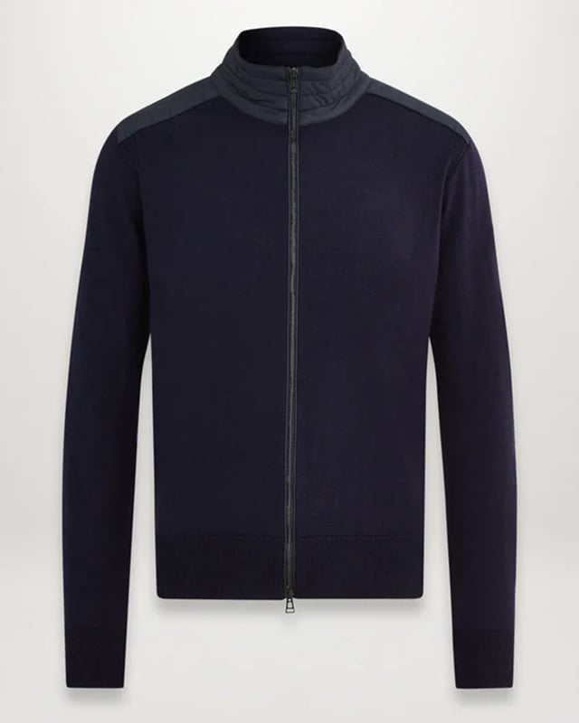 Looking for a truly versatile layer? The Kelby zip cardigan has you covered. Wear it open as a light outer layer or zipped up through its channel-quilted stand collar. Crafted from virgin merino wool, it’s built to see you through the seasons.

Virgin merino wool with polyester detailing
Channel quilted shoulder reinforcement detailing
Ribbed cuffs and hem
Belstaff phoenix patch on left sleeve
Two-way zip centre front closure
Non-mulesed wool

Body: 100% Wool, Woven: 100% Polyester, Filling: 100% Polyester
105598