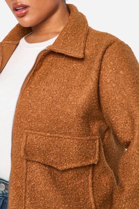 Add the finishing touch to your outfit with this outerwear piece from our women's plus size coats range. A wardrobe staple that's perfect for layering, this style provides added warmth and adds an extra something to your fit. Made with added fabric for the perfect fit, this piece is a whole vibe - just throw on over your fave outfit and you're sorted. Whether you choose a plus size denim jacket or keep things cosy in winter with a plus size teddy coat we've got the hottest coats for curvy girls that are always on-trend. Style: Bomber JacketNeckline: Collared