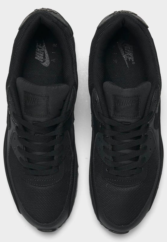 Step up your sneaker game when you step out in the classic Men's Nike Air Max 90 Casual Shoes. Low top silhouette with padded collar and tongue for comfort. - - . Retro runner turned lifestyle sneaker design. - - . Textile upper with synthetic and leather overlays. - - . Nike Max Air unit in heel for support and cushioning. - - . Flexible sole design encourages a more natural stride. - - . Rubber outsole with waffle traction pattern. - - . The Nike Air Max 90 is imported.